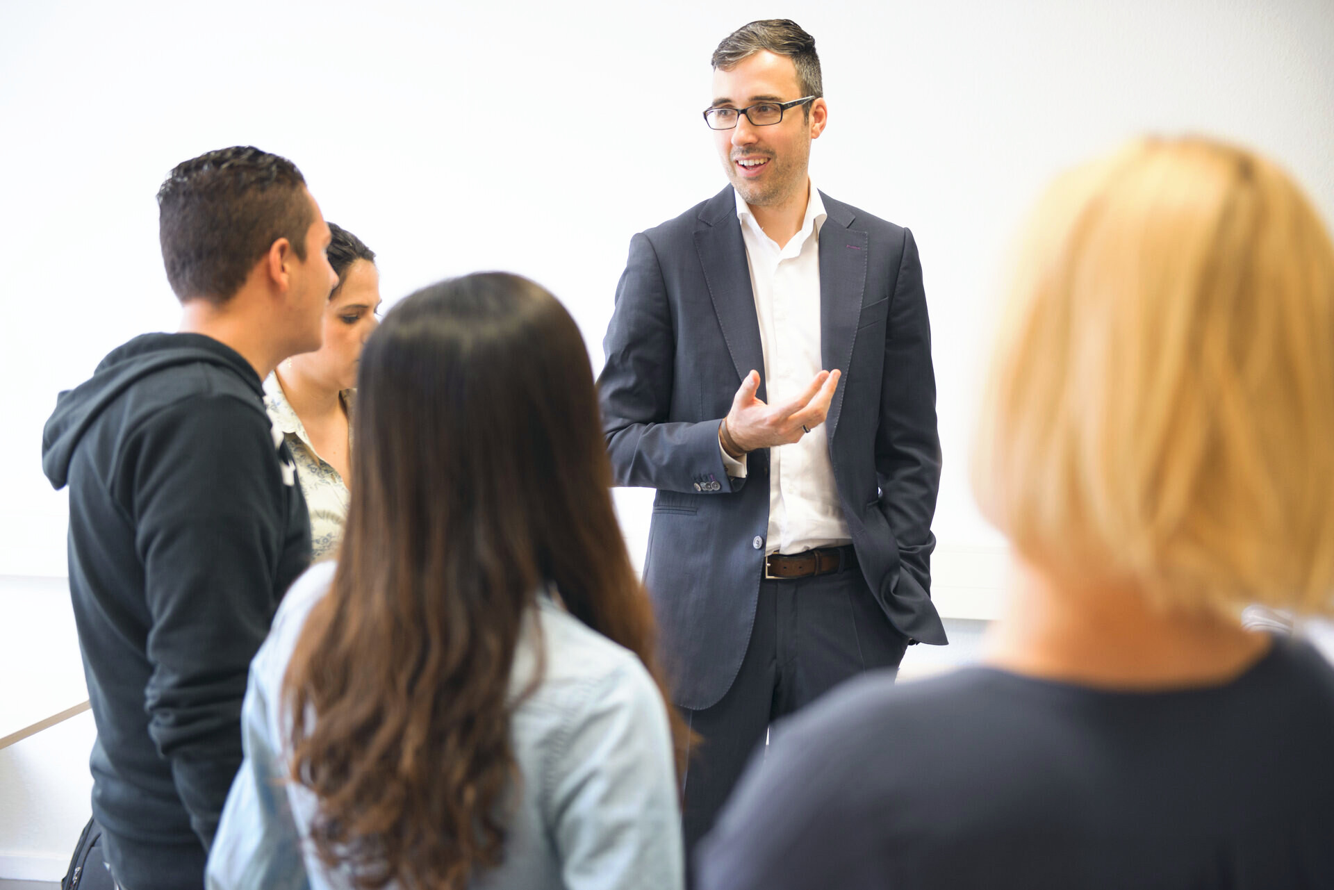 Imre Végh working with a group of leaders during a training day